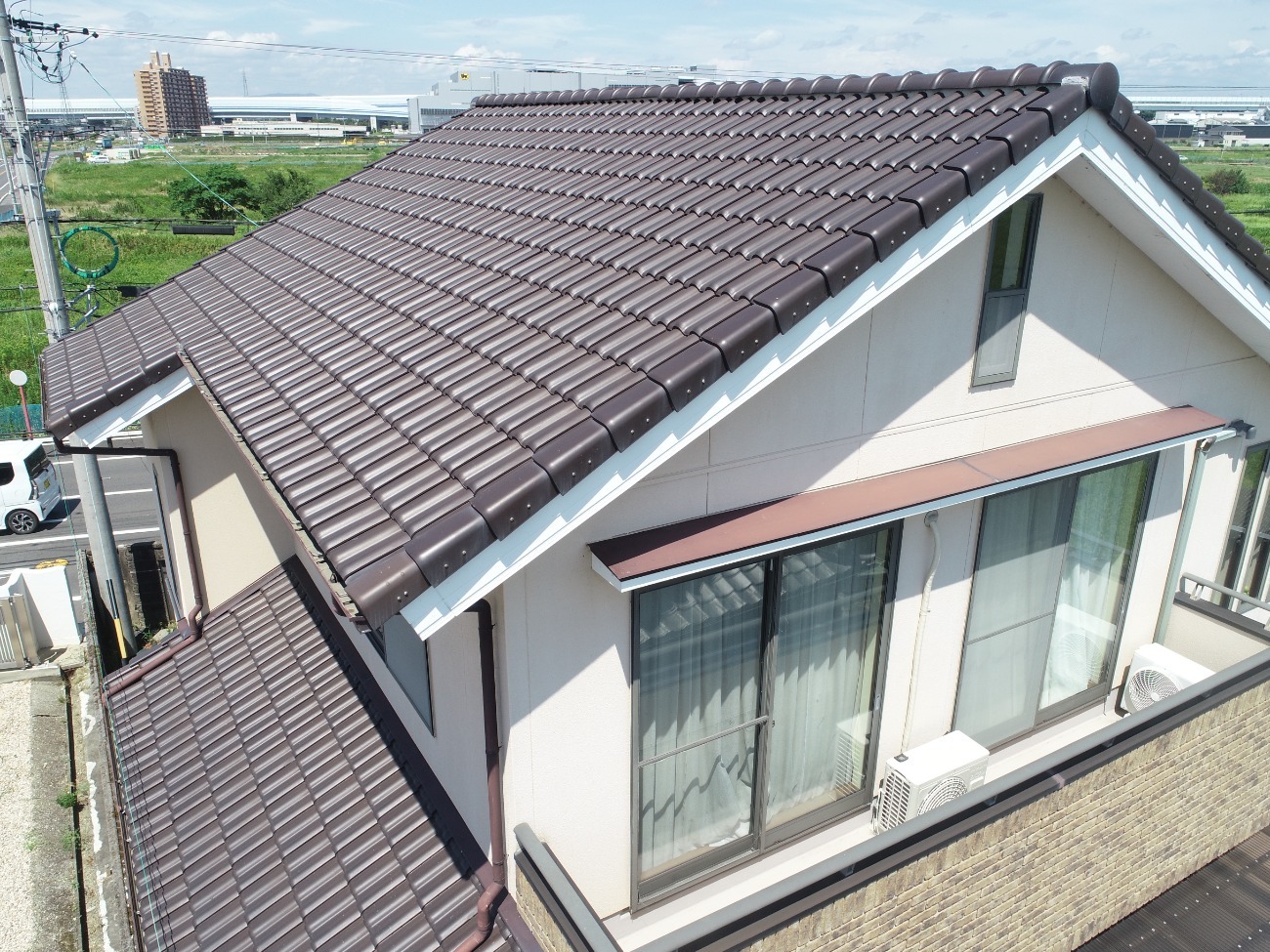 屋根点検実施中の豊田市の住宅